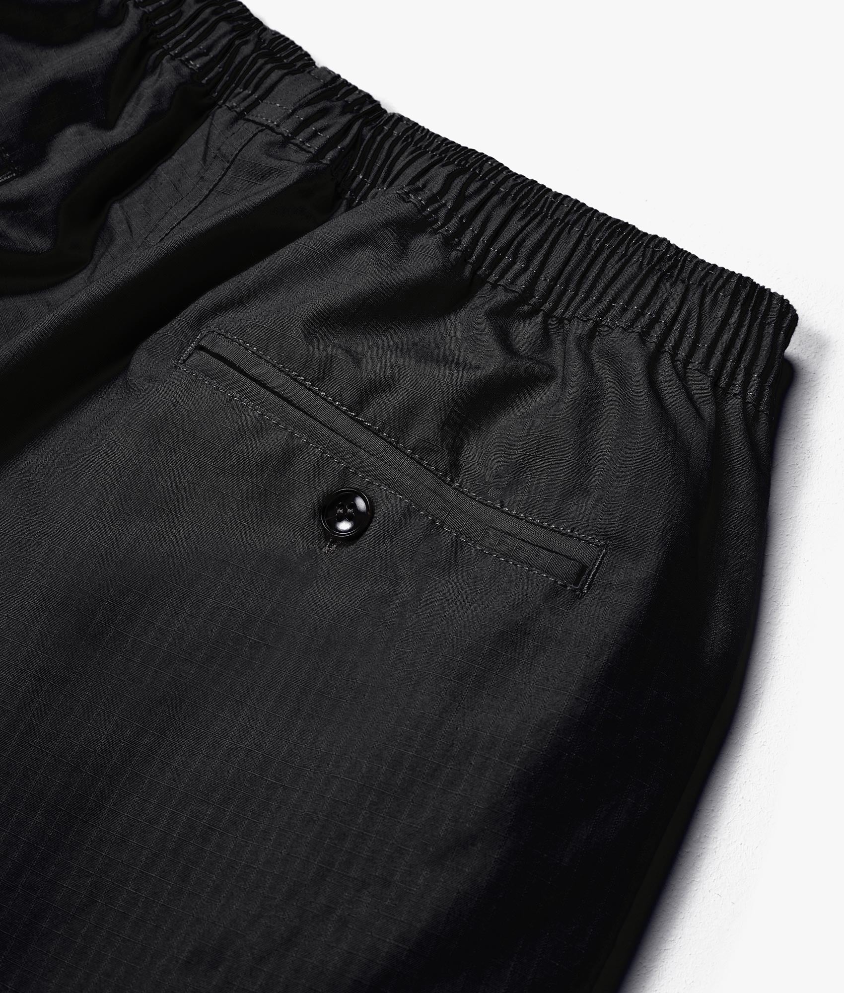 Relaxed Fit Ripstop Cargo Shorts by MKI MIYUI ZOKU. EQVVS Detail Shot.