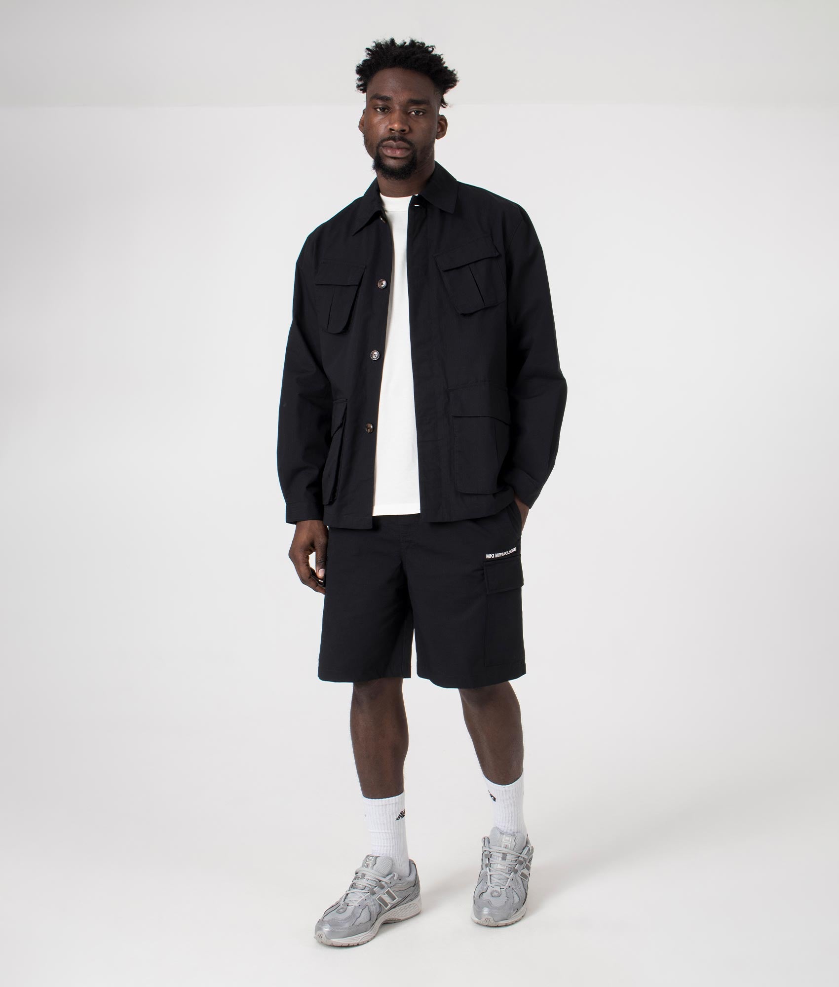 MKI Relaxed Fit Ripstop Cargo Shorts. Full front angle model shot at EQVVS.