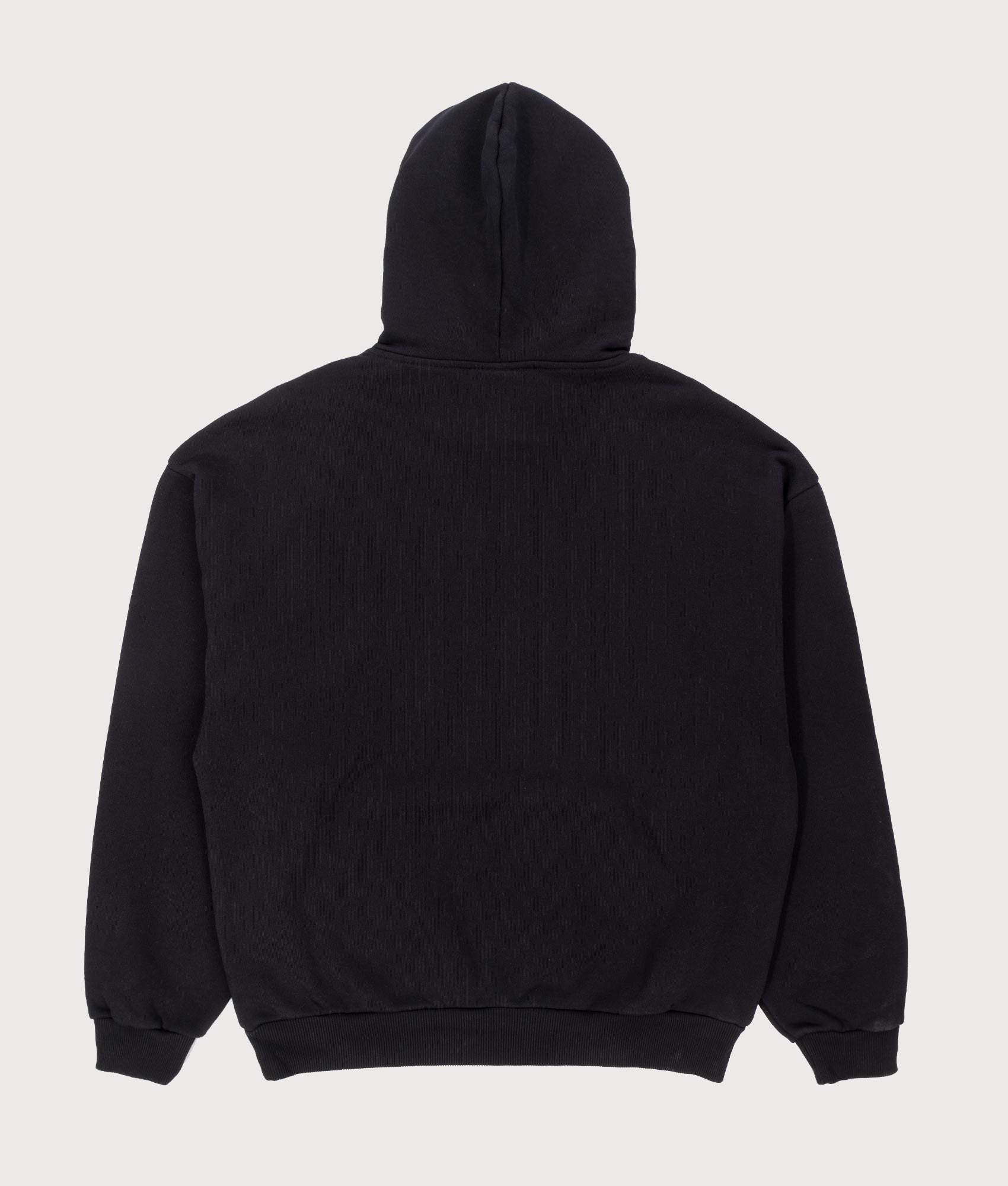 MKI MIYUKI ZOKU Oversized Uniform Hoodie in black at EQVVS Menswear. Model back shot.