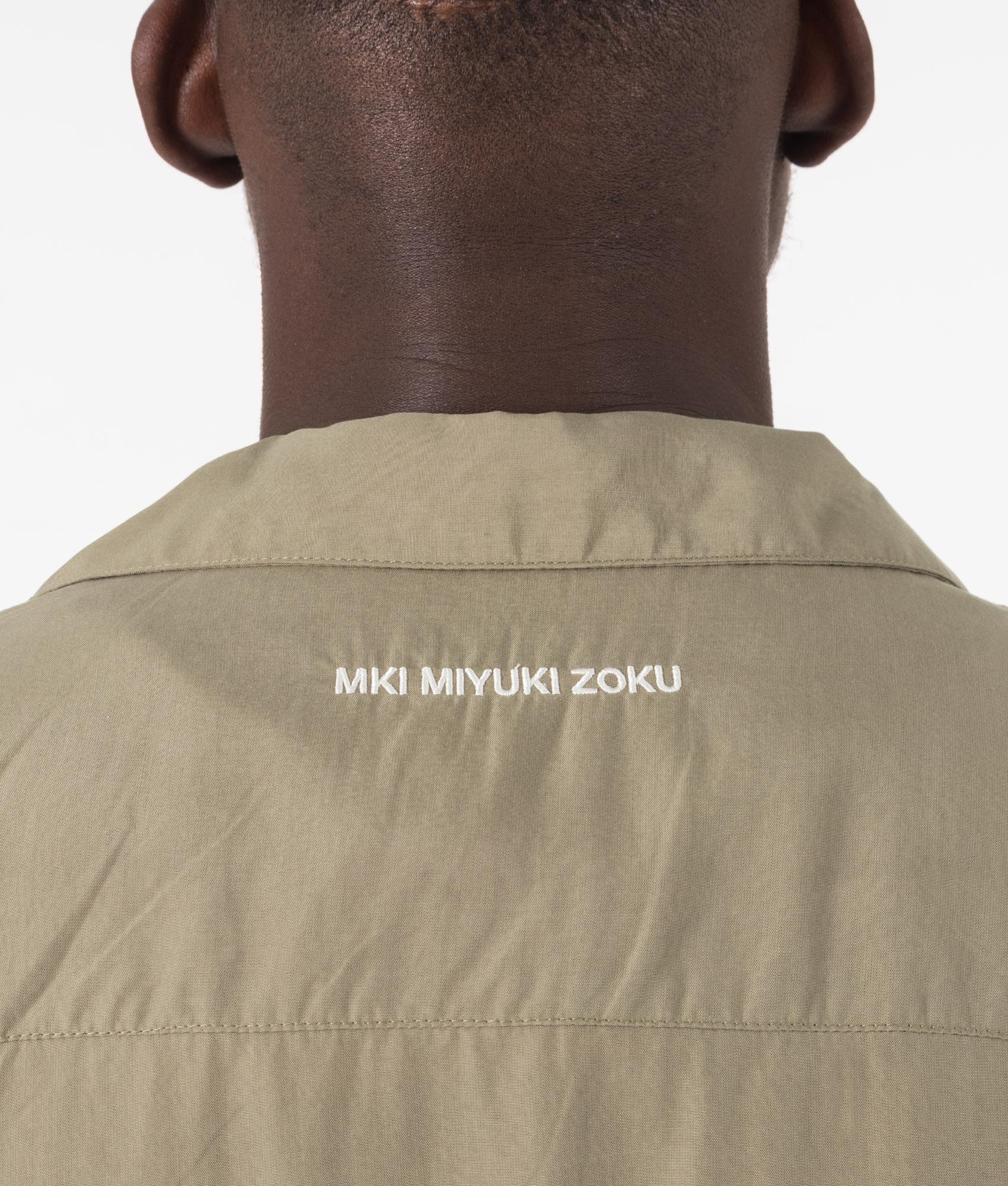 MKI Oversized Tencel Vacation Shirt in Sage Green. Detail angle model shot at EQVVS.