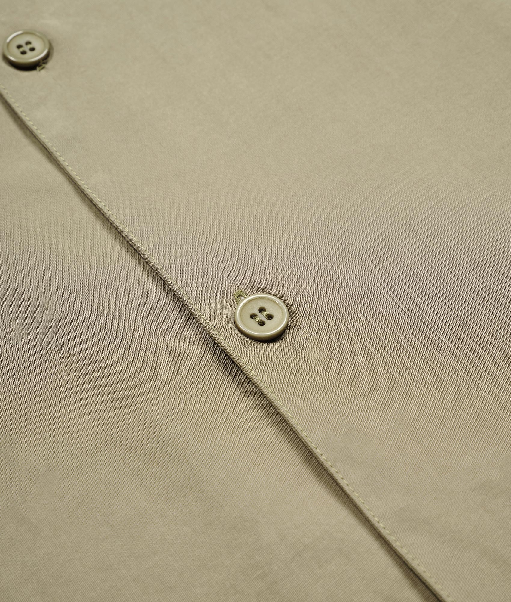 Oversized Tencel Vacation Shirt in Sage Green by MKI MIYUKI ZOKU. EQVVS Close Up Buttons Flat Shot. 