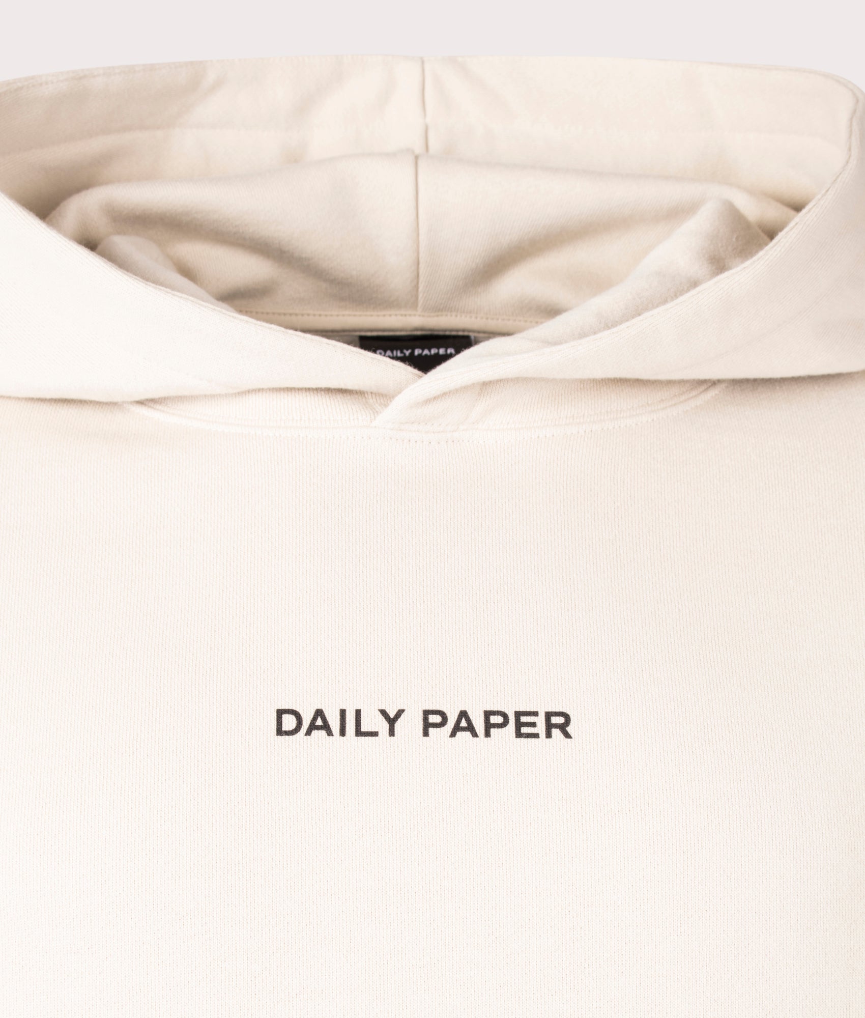Search Hoodie in Pelican Beige by Daily Paper. EQVVS Menswear Front Detail Shot.
