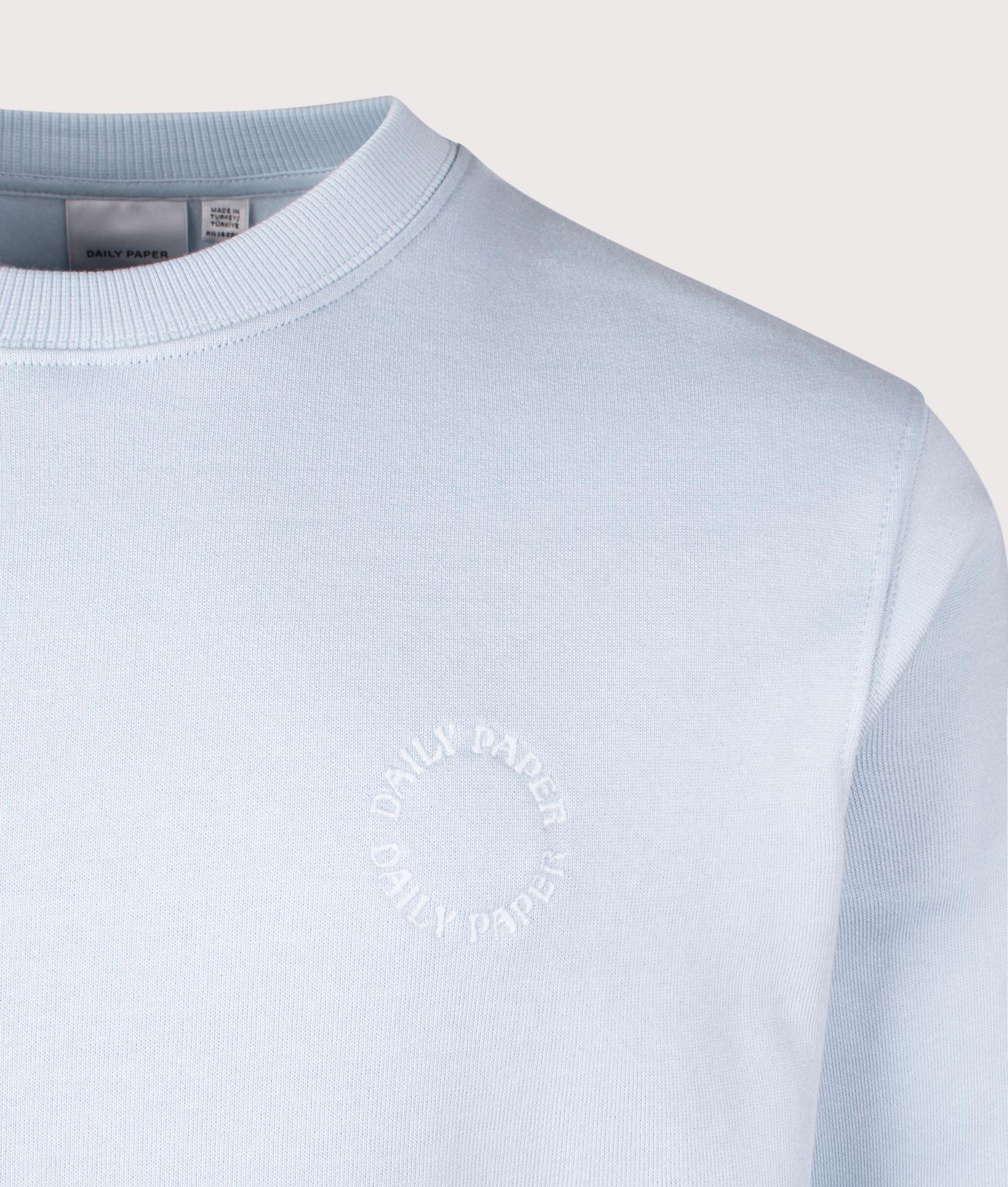 Daily Paper Orbit Emb Sweatshirt in Subdued Blue, 100% cotton at EQVVS. Detailed logo Shot. 