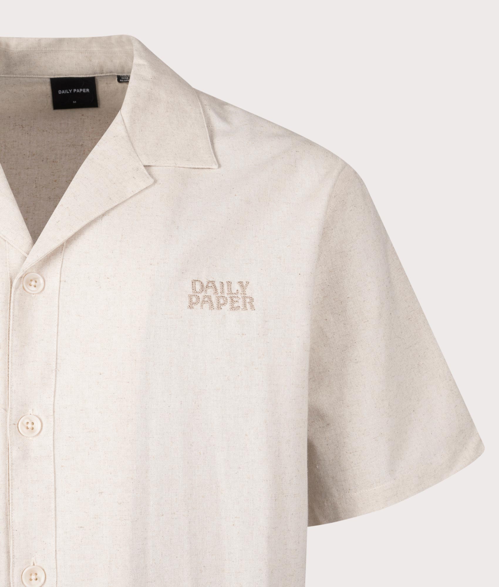 Daily aper Linen Short Sleeve Shirt in Beige at EQVVS. Detail Shot.
