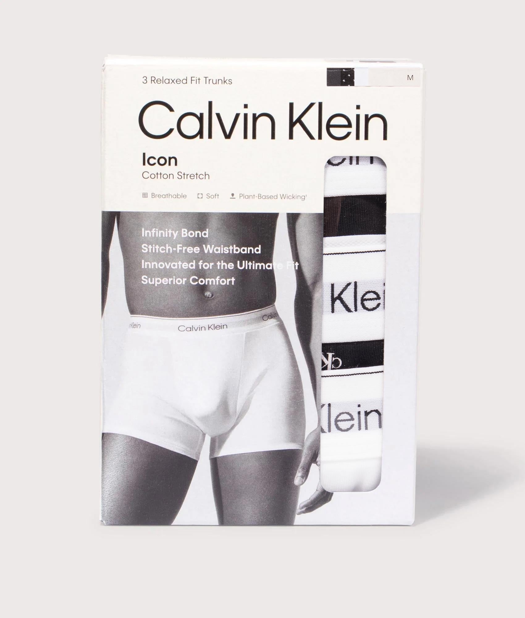 3 Pack Relaxed Fit Trunks in Black/Diamond Logo Black/Classic White by Calvin Klein. Shot by EQVVS. Packaging shot.