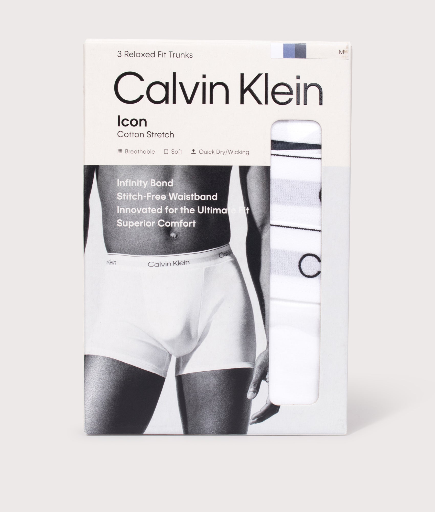 Calvin Klein 3 Pack Relaxed Fit Trunks in White, Blue Tulip and Turbulence at EQVVS Menswear. Box shot.