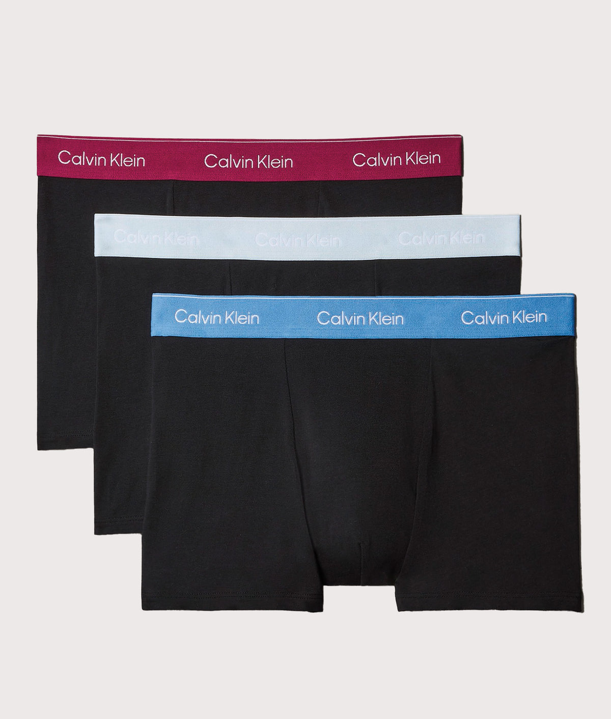 Calvin Klein 3 Pack Relaxed Fit Trunks in Black Bodies, Poseidon Blue and Plein at EQVVS Menswear. Front shot.