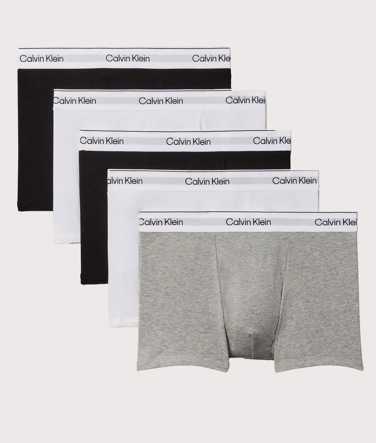 Calvin Klein 5 Pack Relaxed Fit Trunks in Grey Heather, Black and Classic White at EQVVS Menswear. Front shot.