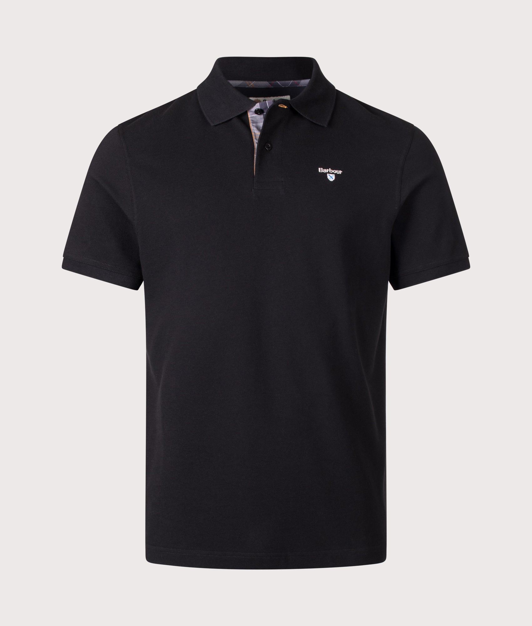 Barbour Lifestyle Tartan Pique Polo Shirt in Black at EQVVS Menswear. Front shot.