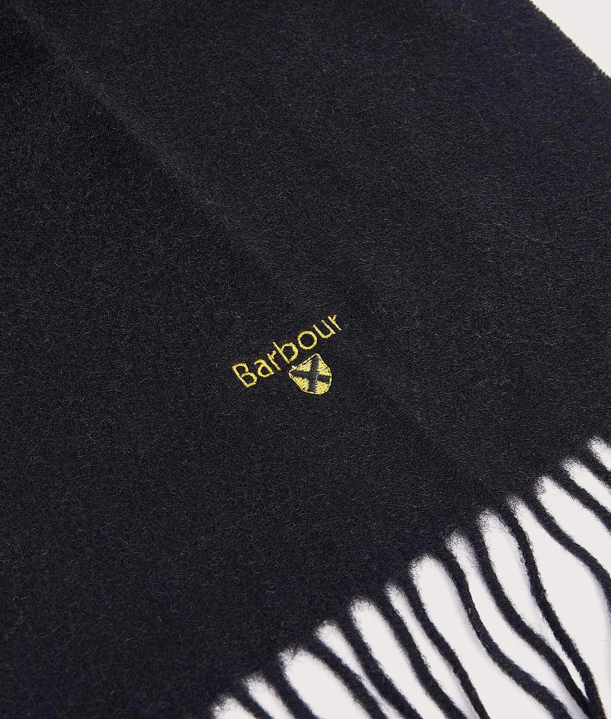 Barbour Lifestyle Plain Lambswool Scarf in Black at EQVVS Menswear. Detail shot.