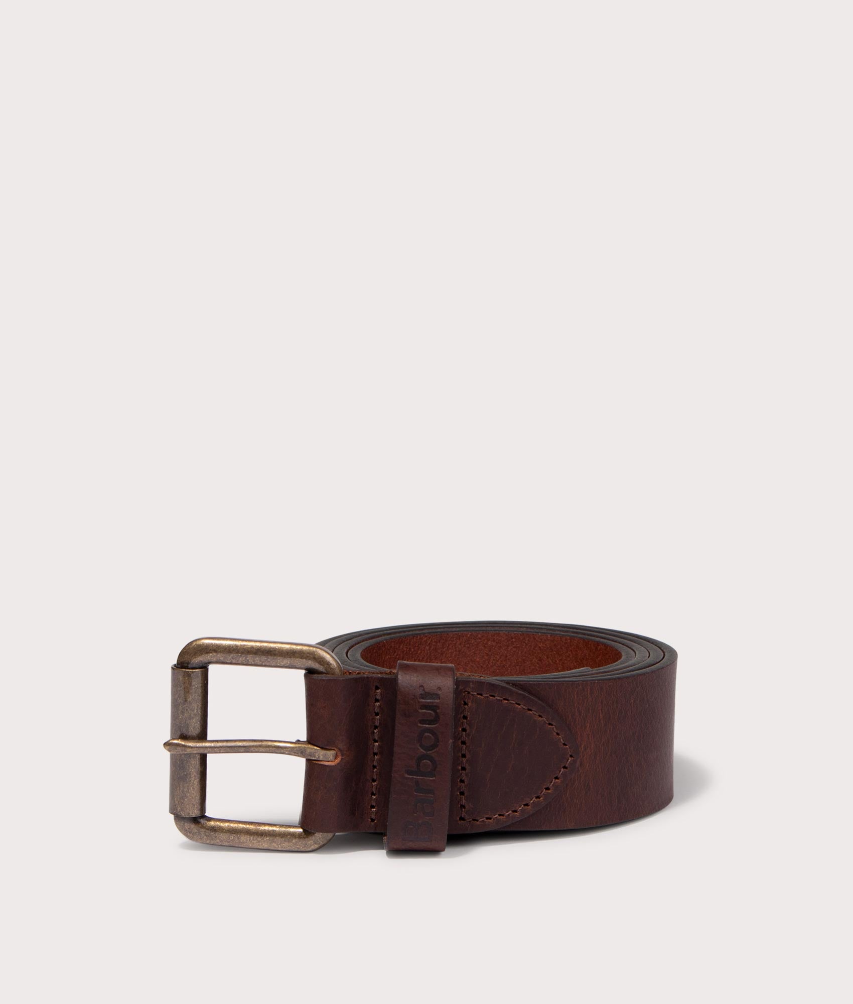 Barbour Allanton Leather Belt in Brown at EQVVS Menswear. Rolled up shot.