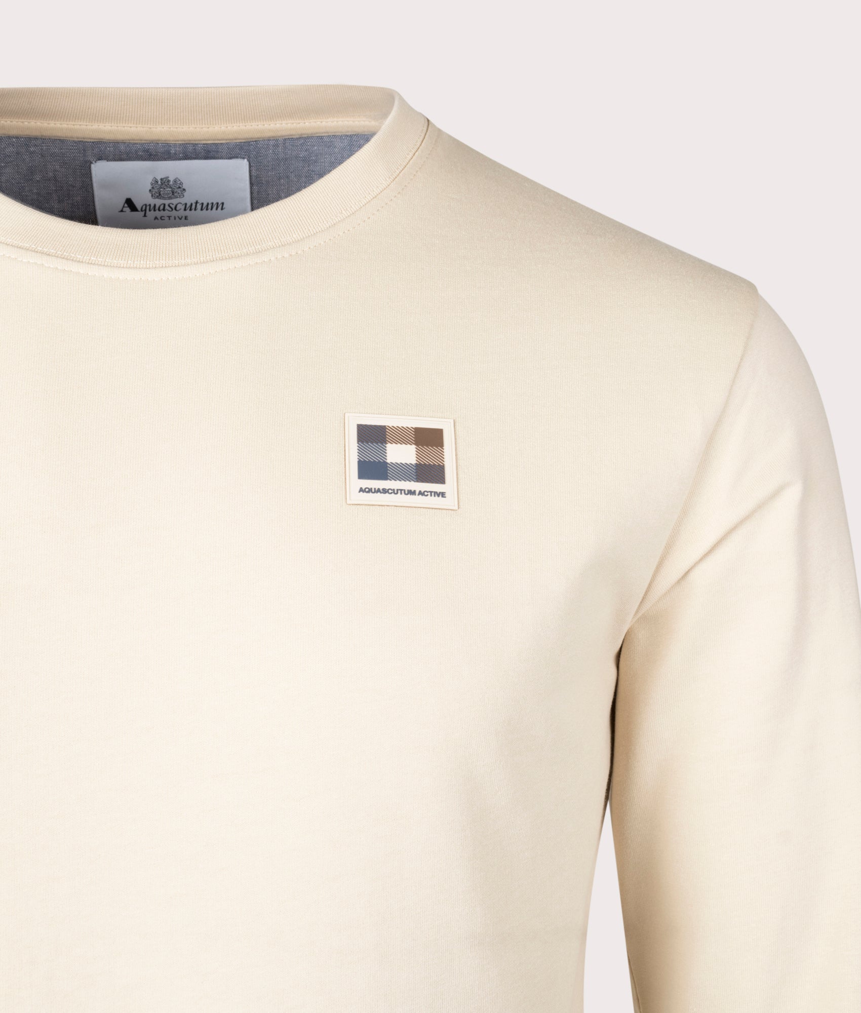 Active Club Check Patch Sweatshirt in Beige by Aquascutum. EQVVS Detail Shot.