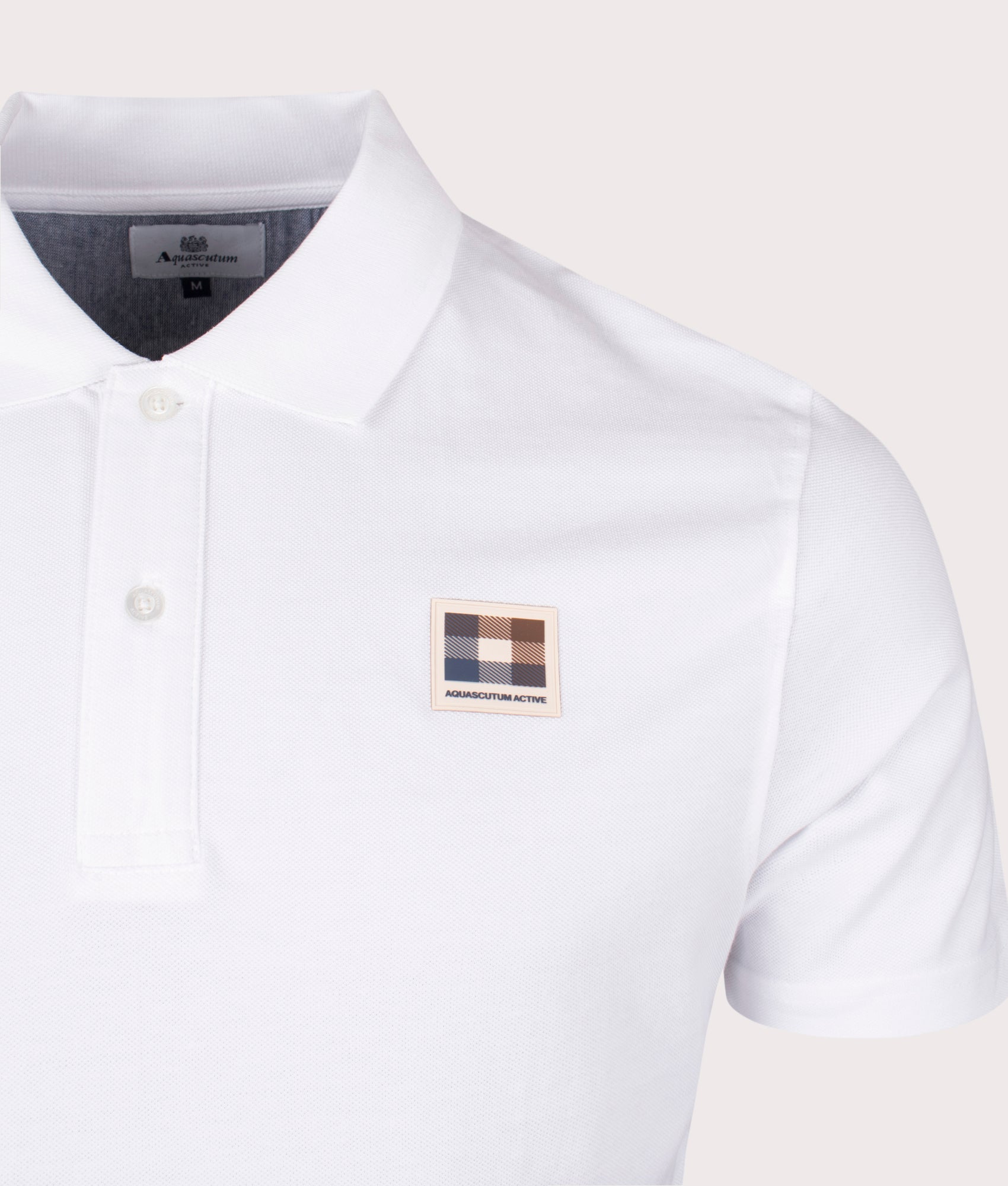Active Check Patch Polo Shirt in Optical White by Aquascutum. EQVVS Detail Shot.