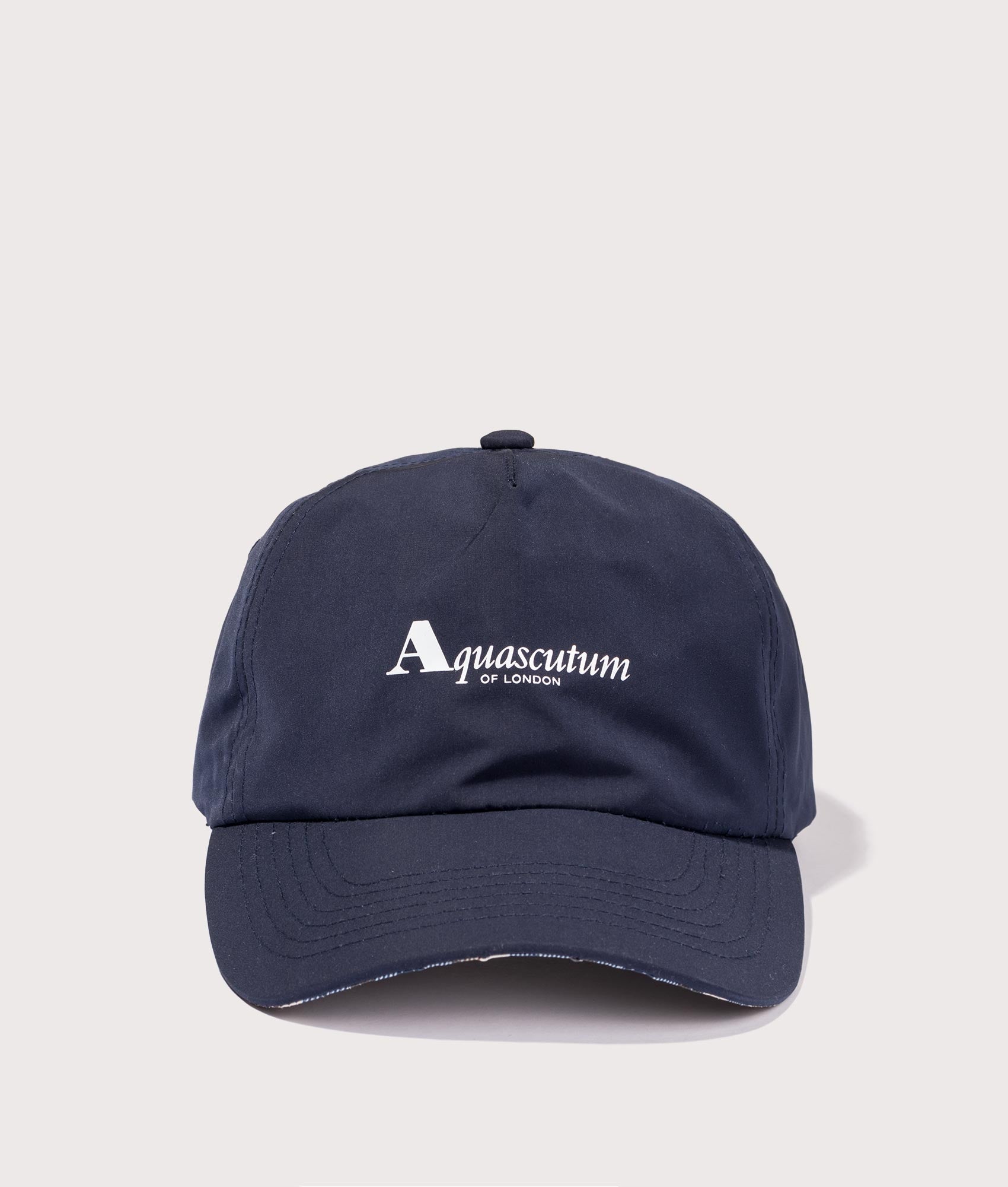 Active Cap in Navy by Aquascutum. EQVVS Front Angle Shot.
