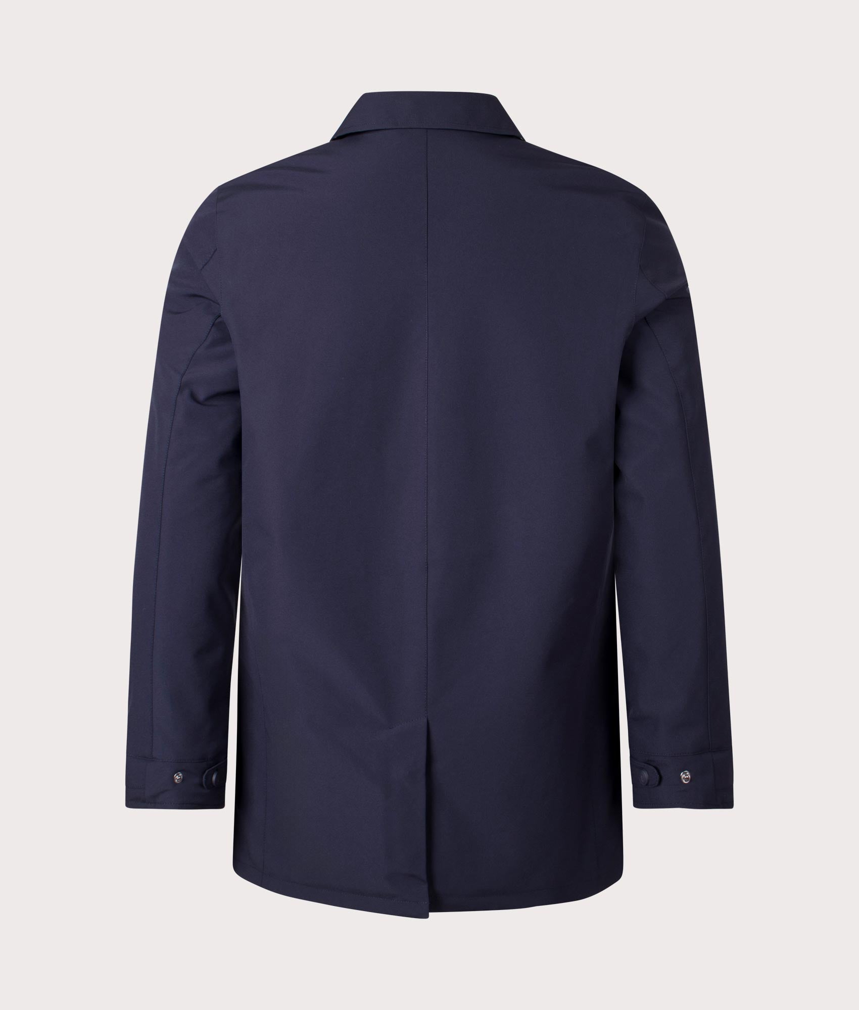 100% Polyester Active Shell Trench Coat in Navy by Aquascutum. Shot at EQVVS. Back shot. 