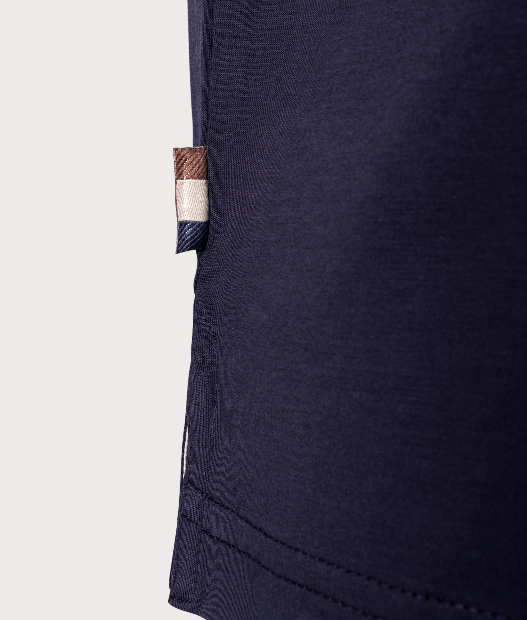 Aquascutum Supima Polo Shirt in Navy Blue. Shot at EQVVS. Detail shot. 