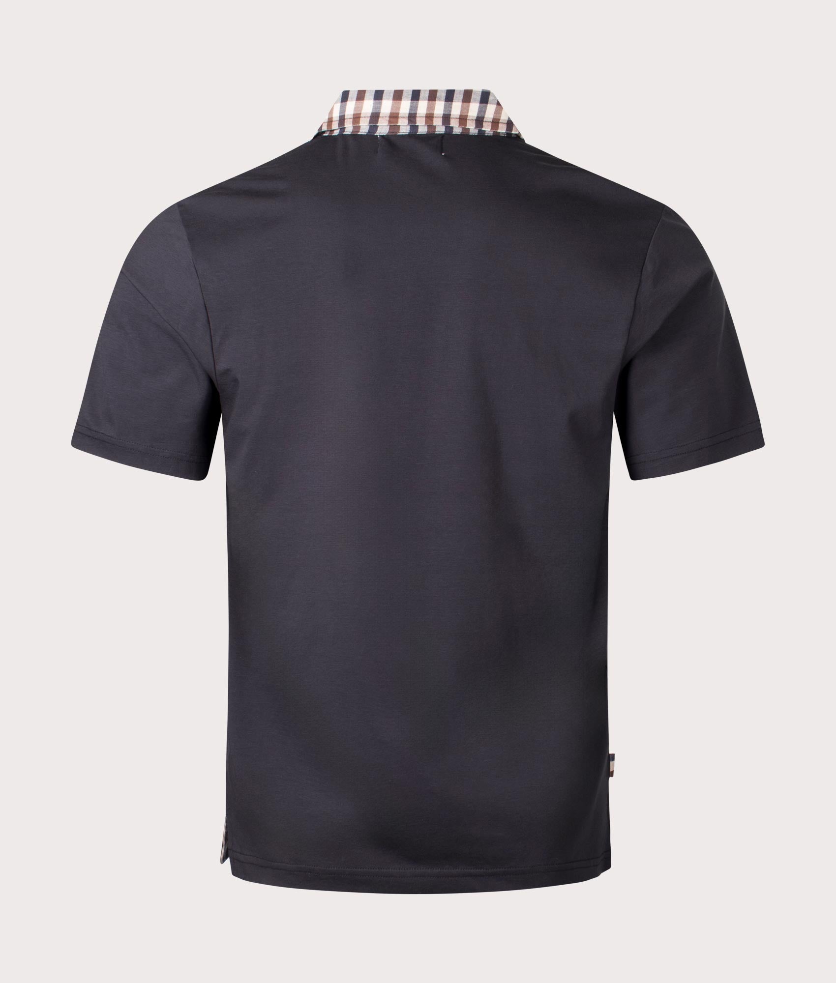 Supima Black Polo Shirt by Aquascutum. Shot at EQVVS. Reverse shot. 