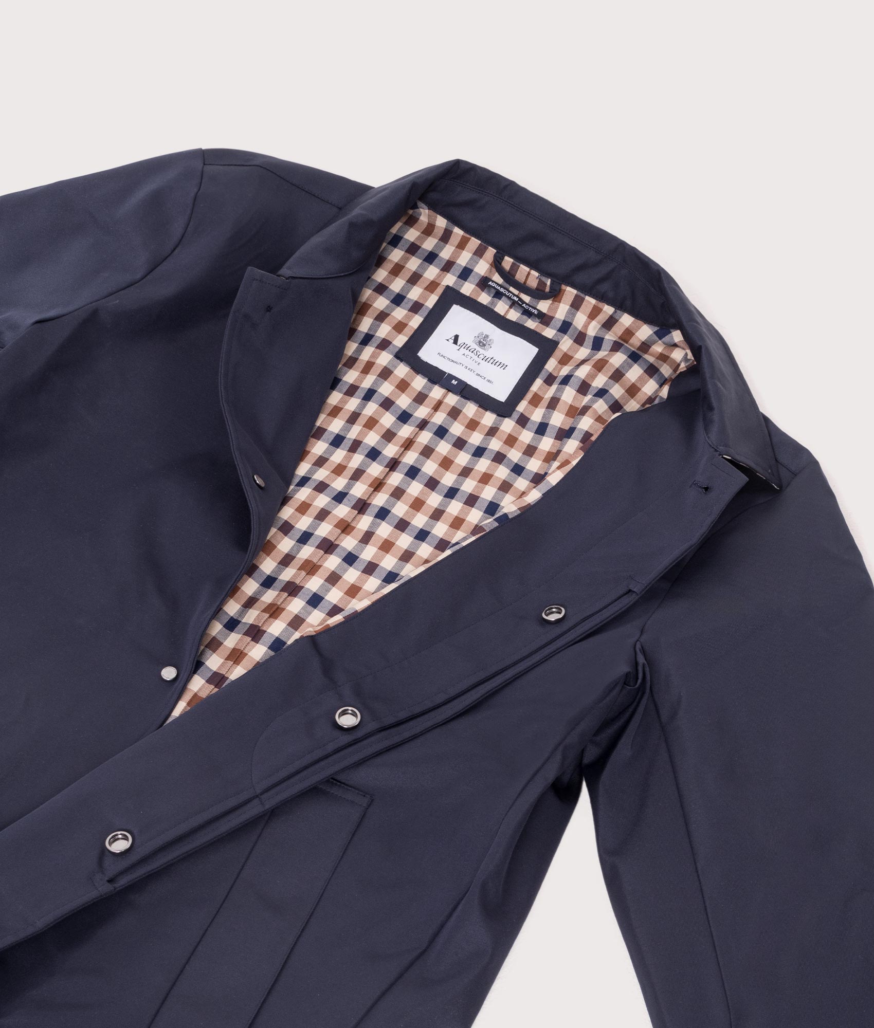 Aquascutum Iconic Caban Mac in Navy at EQVVS. inside shot.