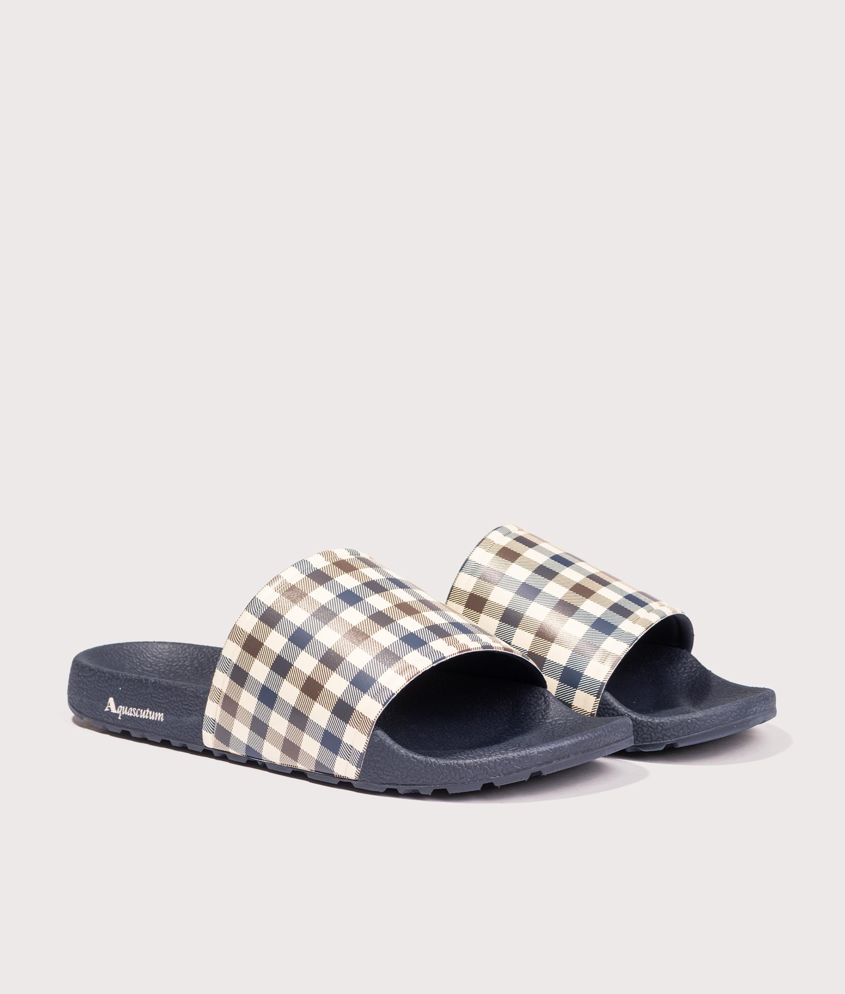 Iconic Slippers. Shot by EQVVS. Front angled shot.