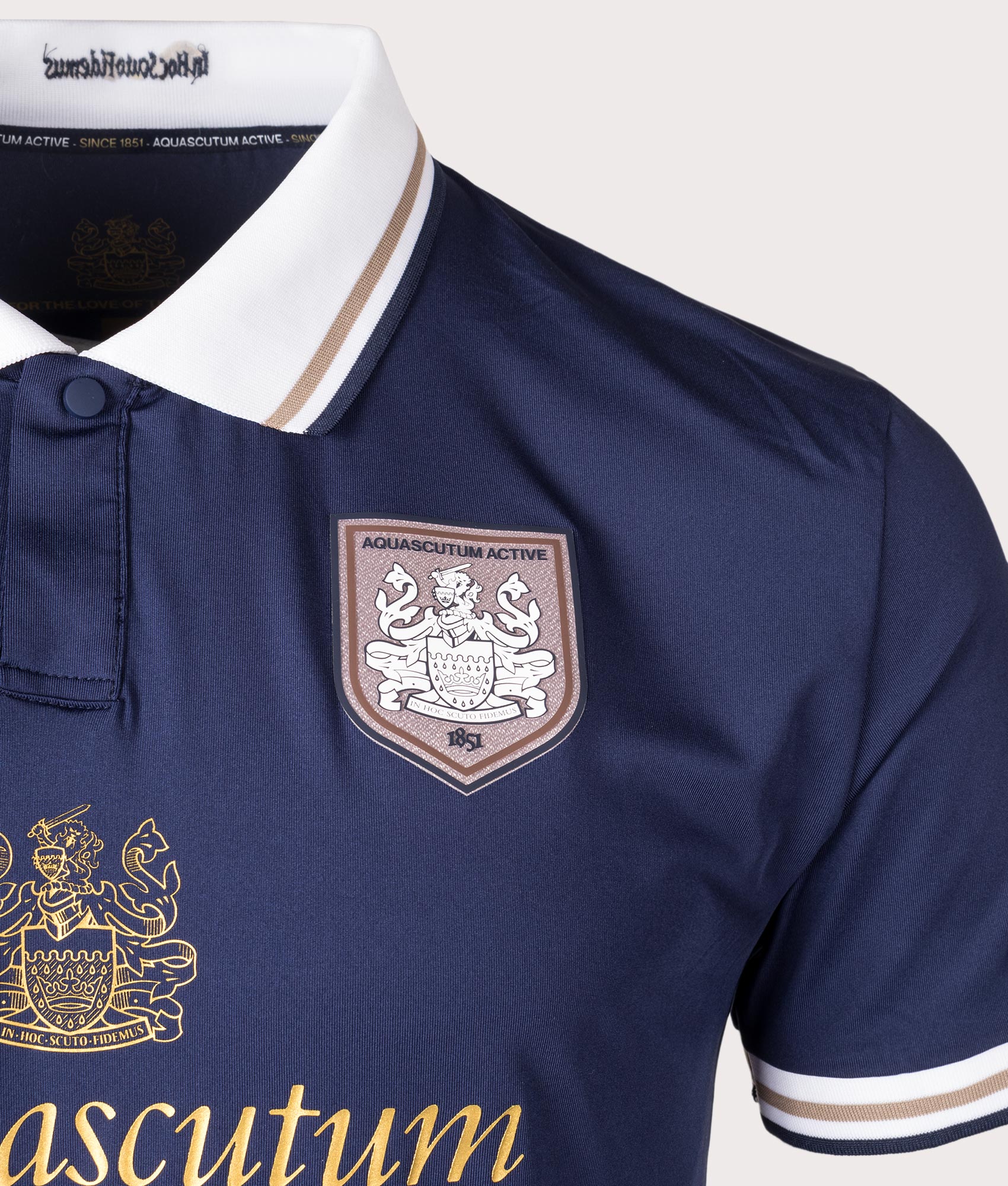 Aquascutum Since 1851 Home Polo Shirt in Navy. Shot at EQVVS.  Detail shot. 
