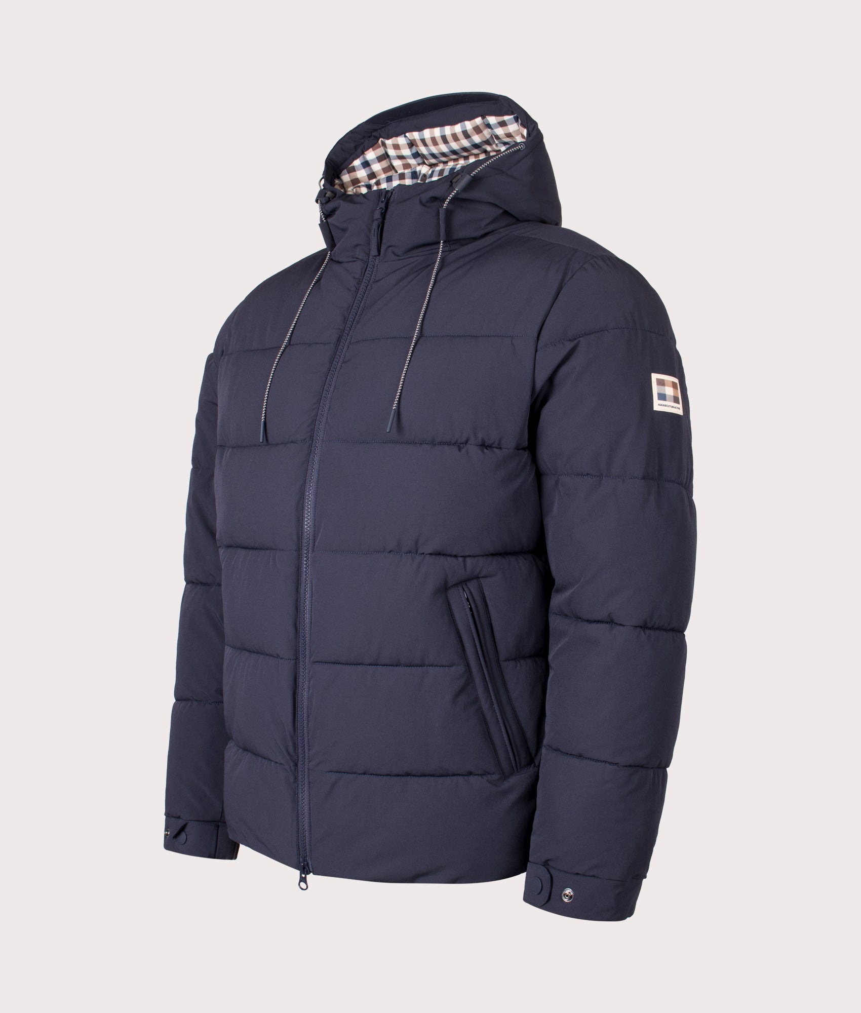 Aquascutum SP Hooded Puffer coat in Navy at EQVVS Menswear. Angled front shot.