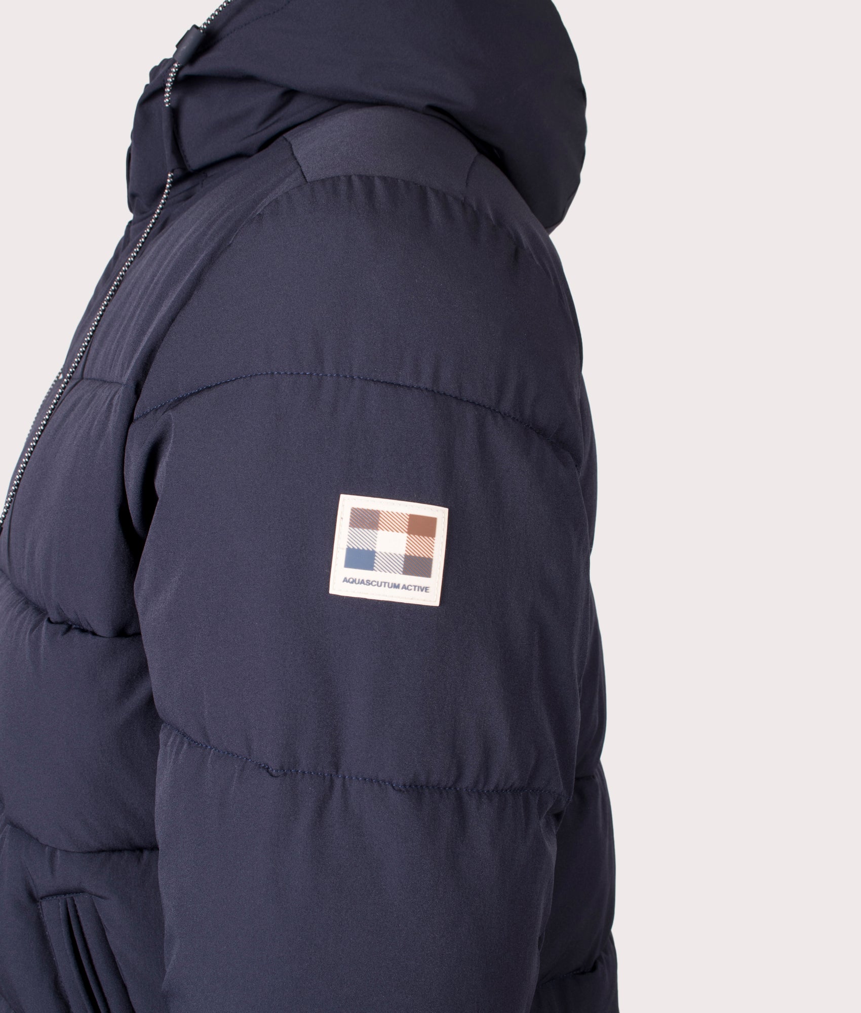 Aquascutum SP Hooded Puffer coat in Navy at EQVVS Menswear. Sleeve detail shot.