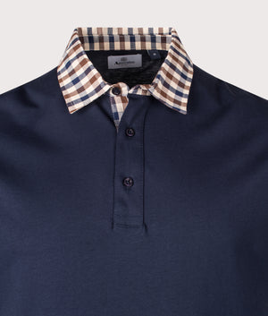 Club Check Collar Polo Shirt by Aquascutum in Navy. Shot by EQVVS. Detail shot.