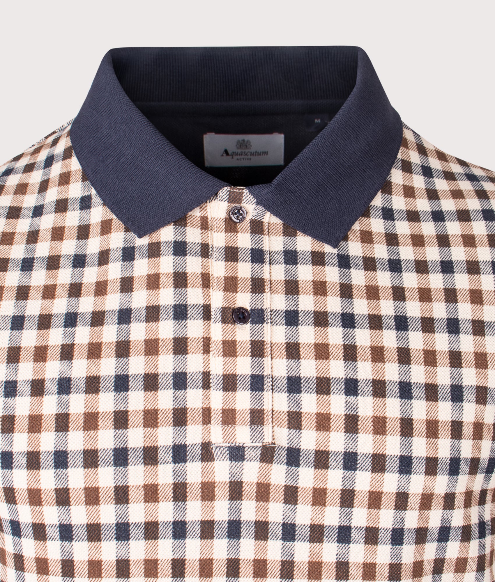 Long Sleeve Iconic Polo Shirt by Aquascutum in Navy. Shot by EQVVS. Detail shot.