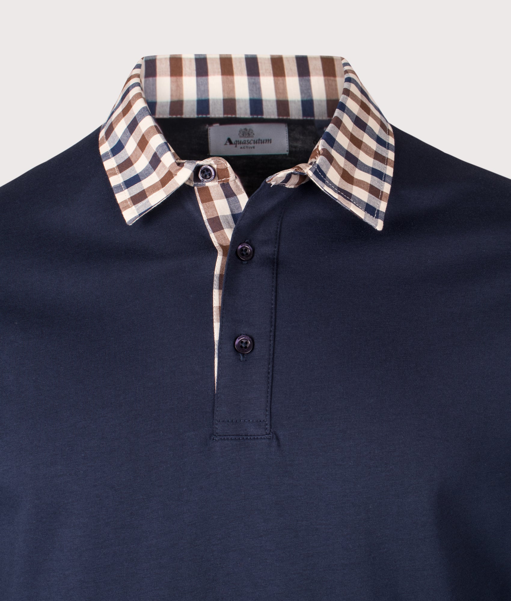 Club Check Collar Long Sleeve Polo Shirt by Aquascutum in Navy. Shot by EQVVS. Detail shot.
