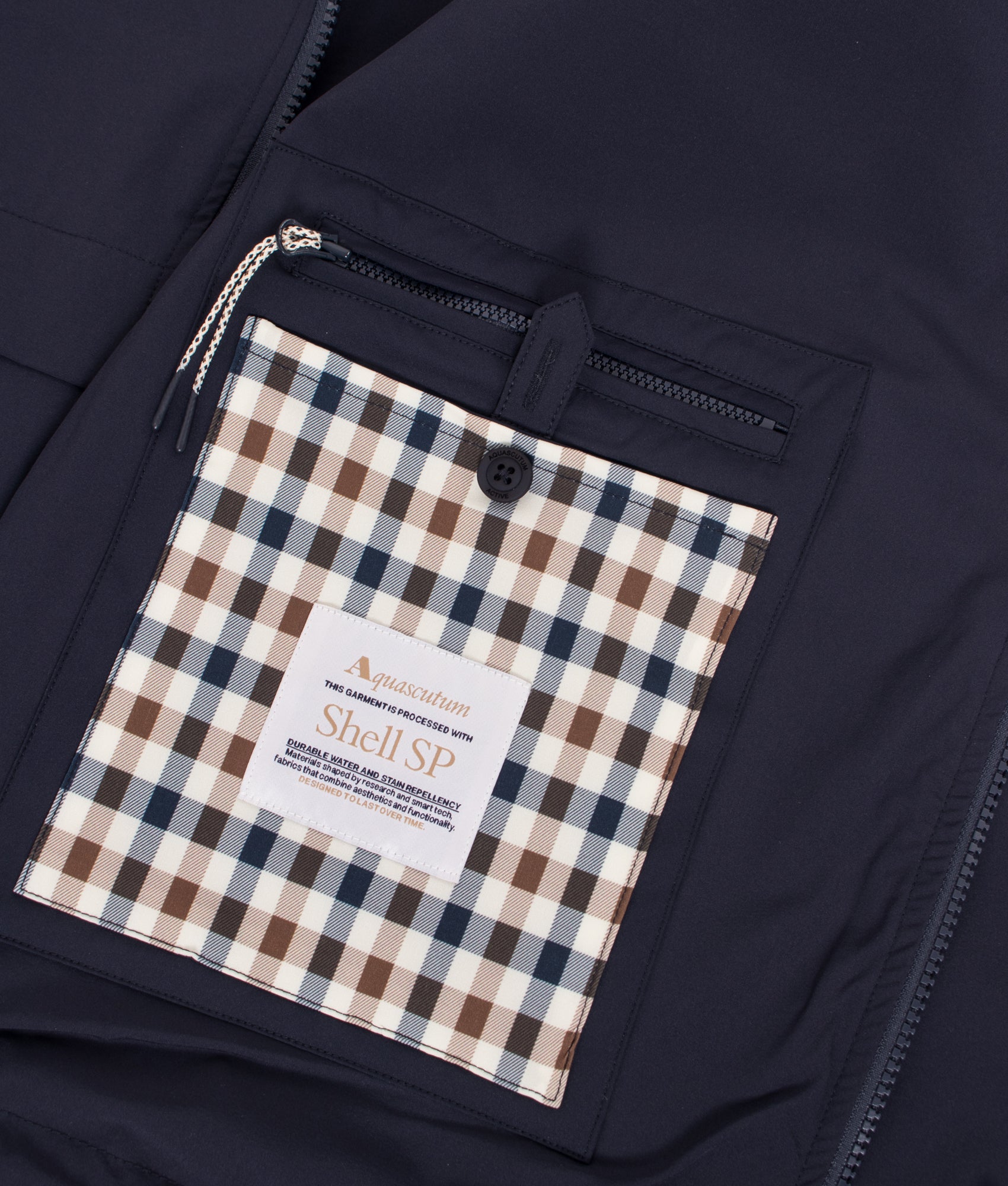 Aquascutum Shell SP Hooded Jacket in Navy at EQVVS Menswear. Inside detail shot.
