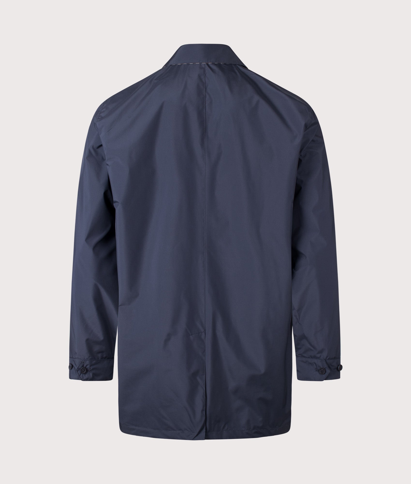 Aquascutum RLG Badge Packable Trench Coat in Navy at EQVVS Menswear. Back shot.