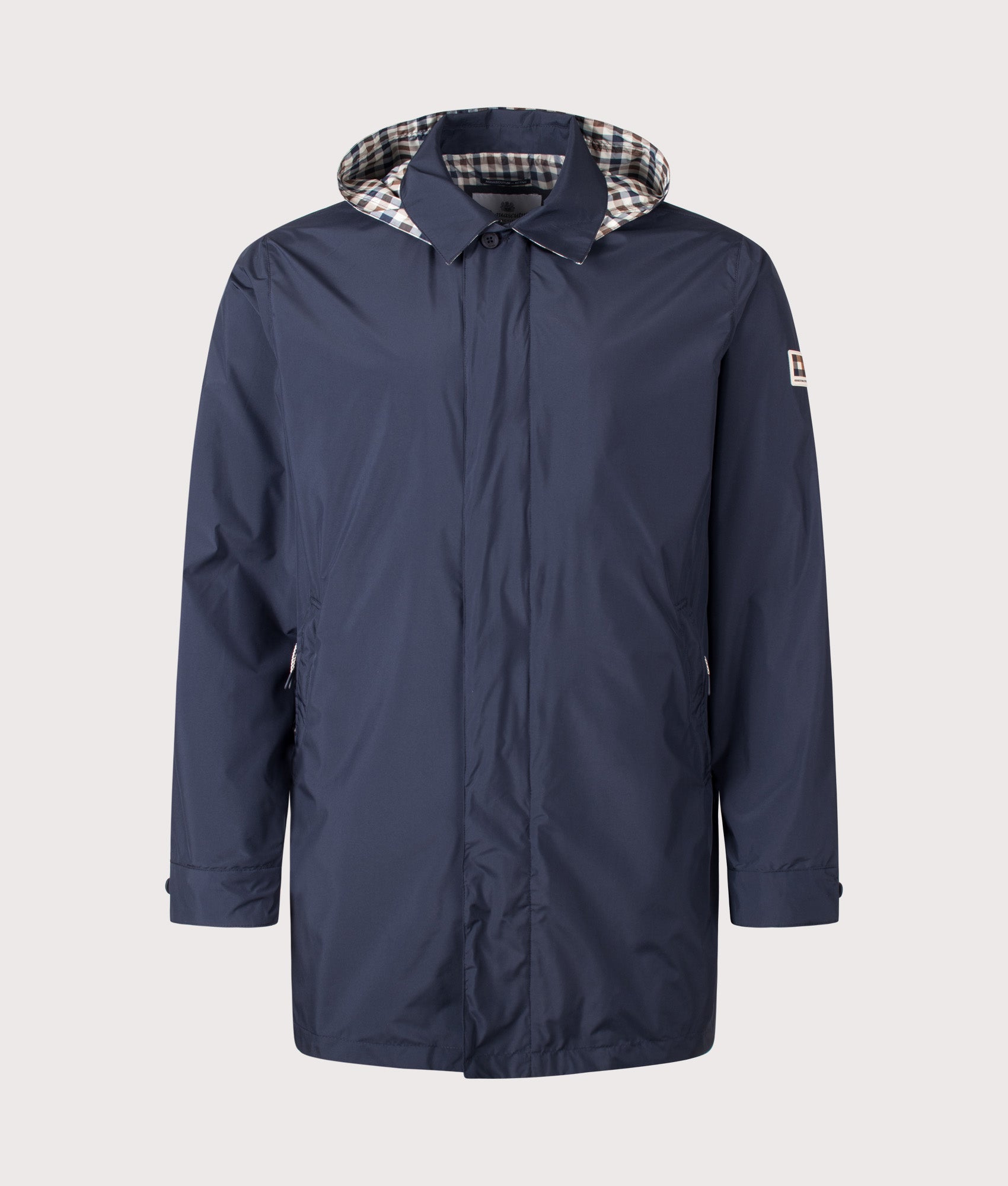 Aquascutum RLG Badge Packable Trench Coat in Navy at EQVVS Menswear. Front shot.