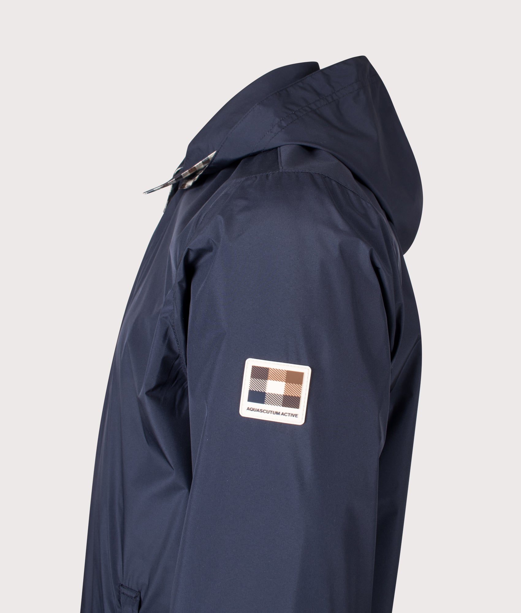 Aquascutum RLG Badge Packable Trench Coat in Navy at EQVVS Menswear. Side detail shot.