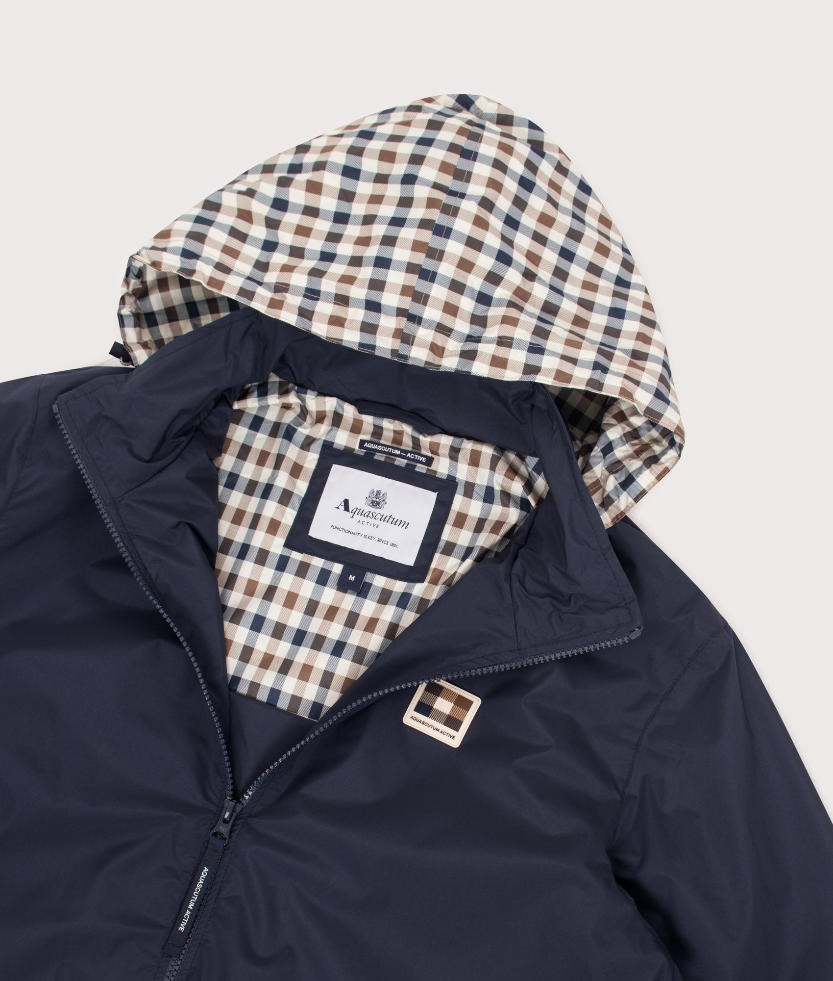 Aquascutum RLG Badge Windbreaker in Navy at EQVVS Menswear. Detail shot.