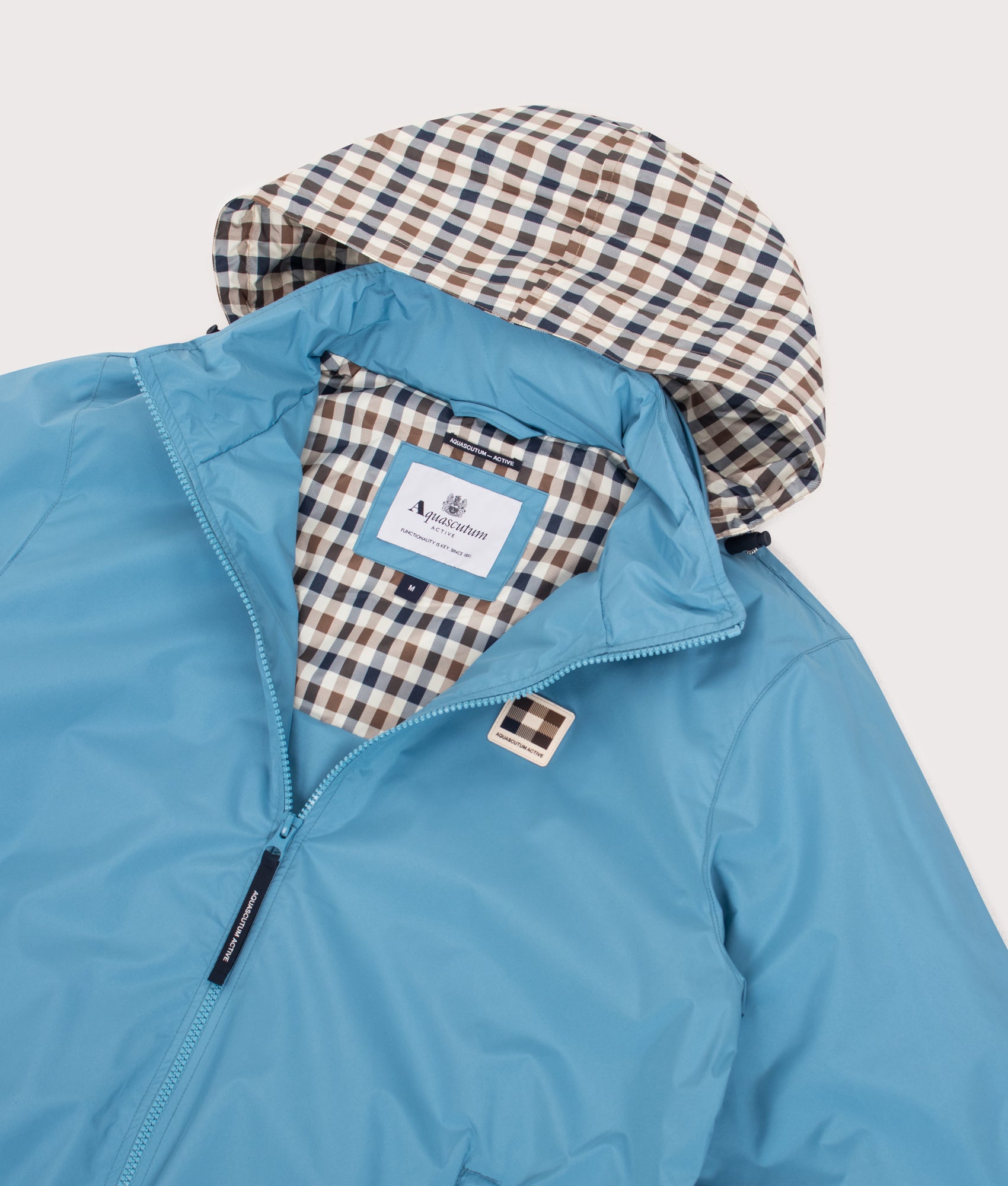 Aquascutum RLG Badge Windbreaker in Avio at EQVVS Menswear. Detail shot.