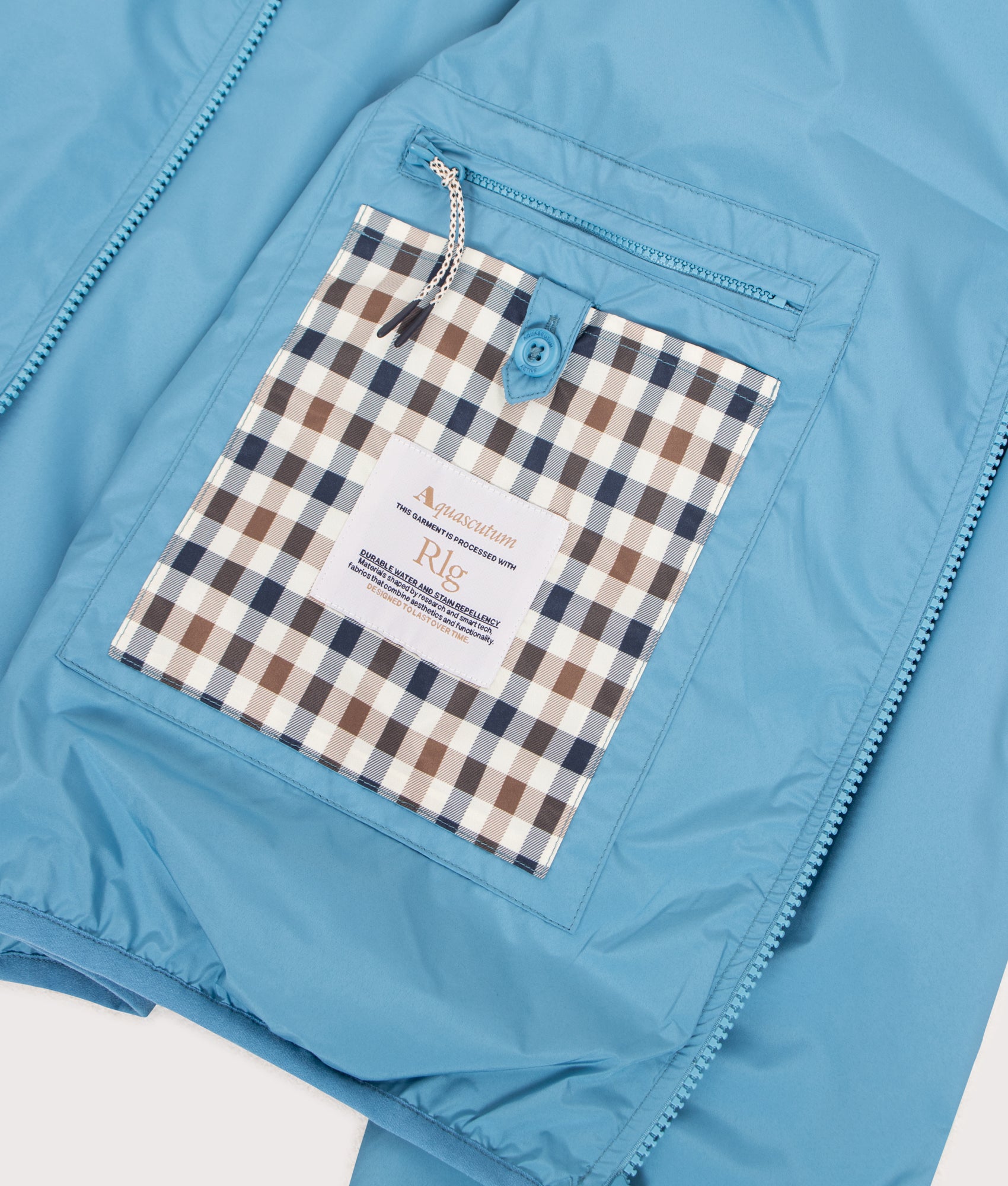 Aquascutum RLG Badge Windbreaker in Avio at EQVVS Menswear. Internal detail shot.