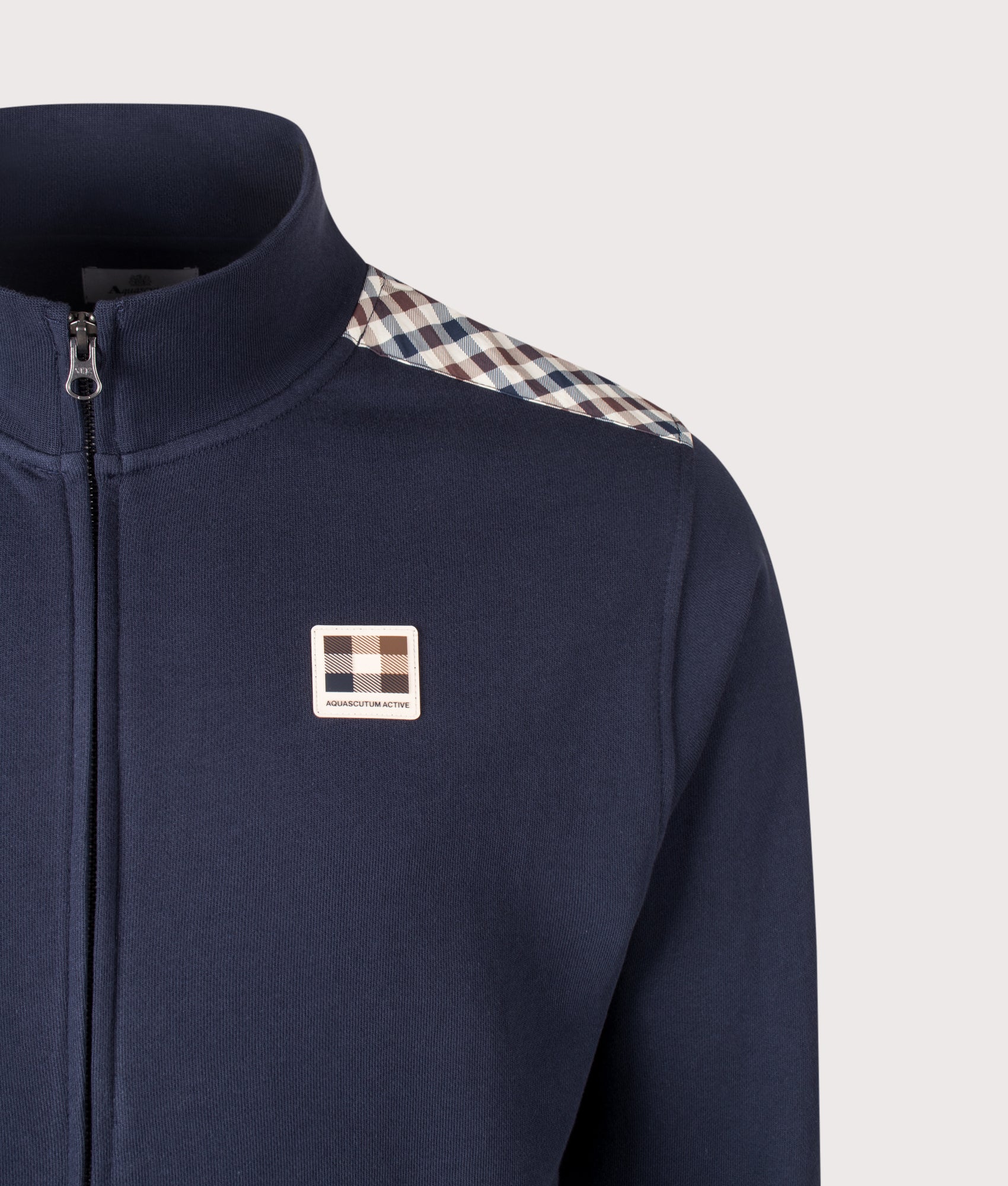Aquascutum Lamina Insert Mock Neck Track Top in Navy at EQVVS Menswear. Detail shot.