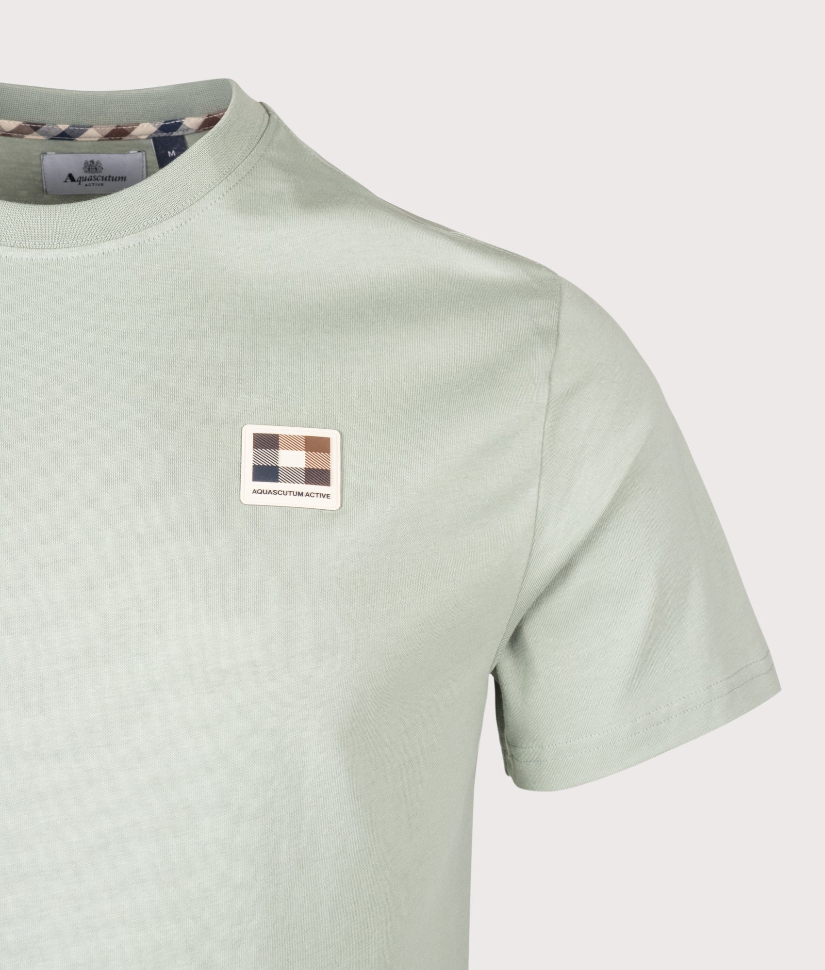 Aquascutum Badge T-Shirt in Salvia at EQVVS Menswear. Detail shot.