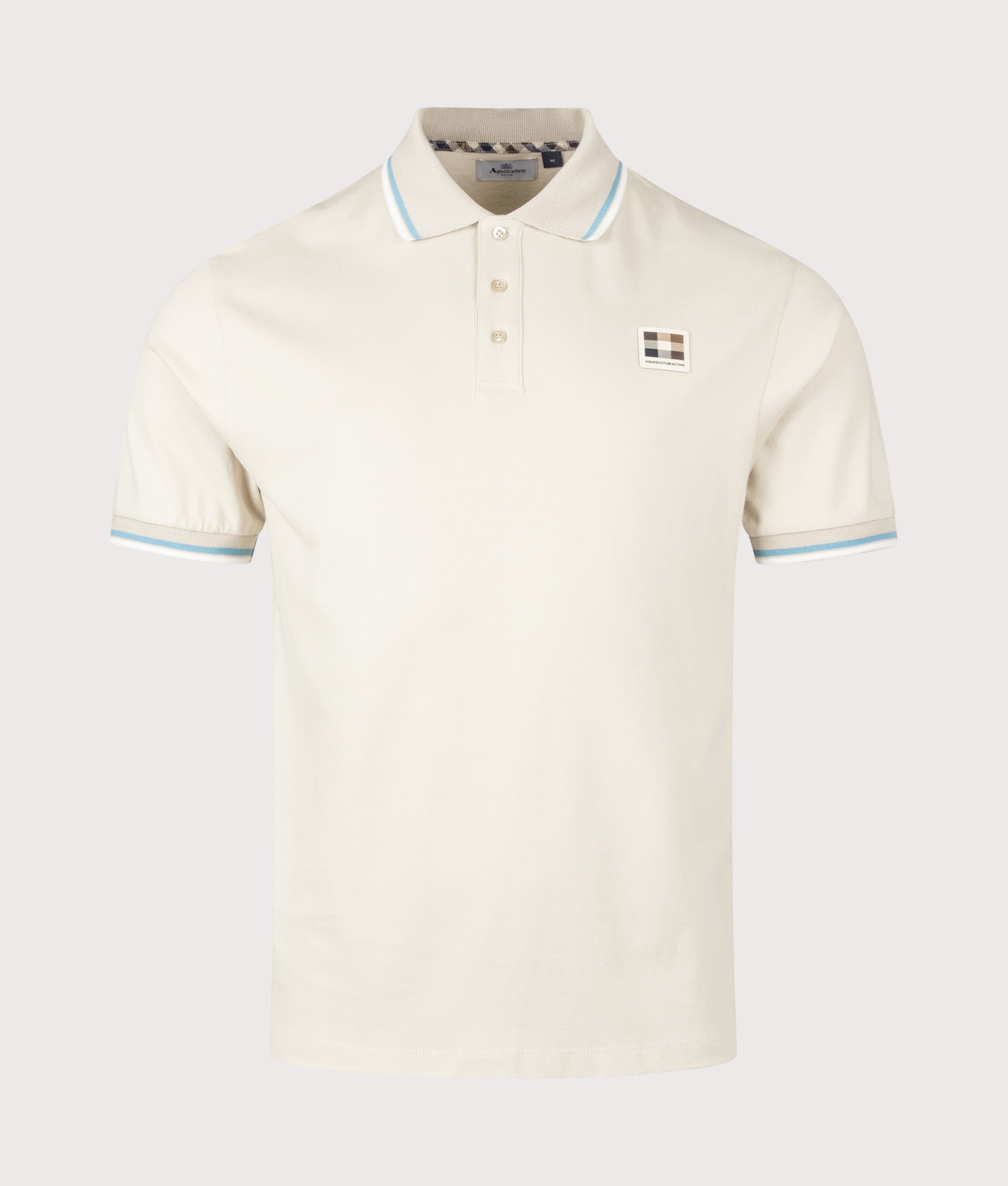 Aquascutum Stretch Piquet Stripes Polo Shirt in Beige at EQVVS Menswear. Front shot.
