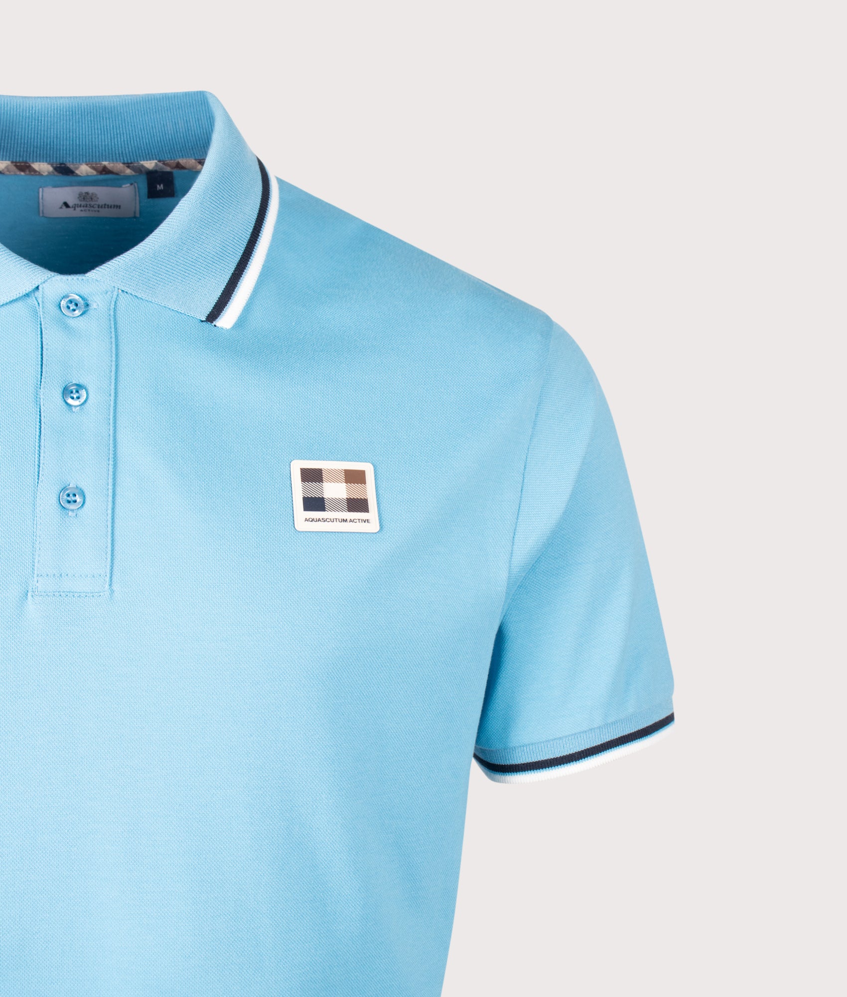 Aquascutum Stretch Piquet Stripes Polo Shirt in Avio at EQVVS Menswear. Detail shot.