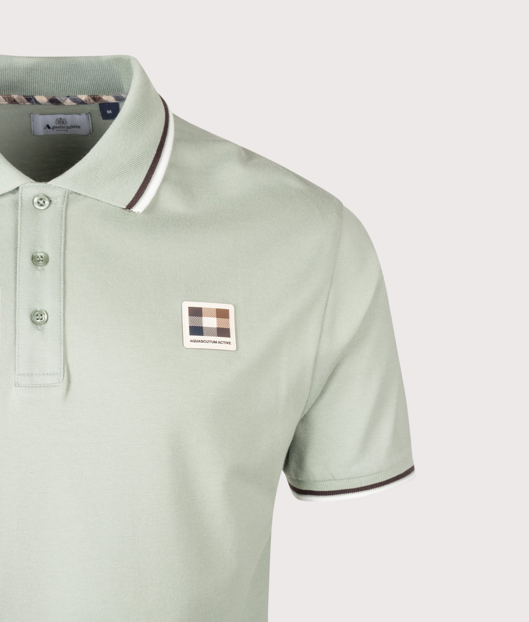 Aquascutum Stretch Piquet Stripes Polo Shirt in Salvia at EQVVS Menswear. Detail shot.