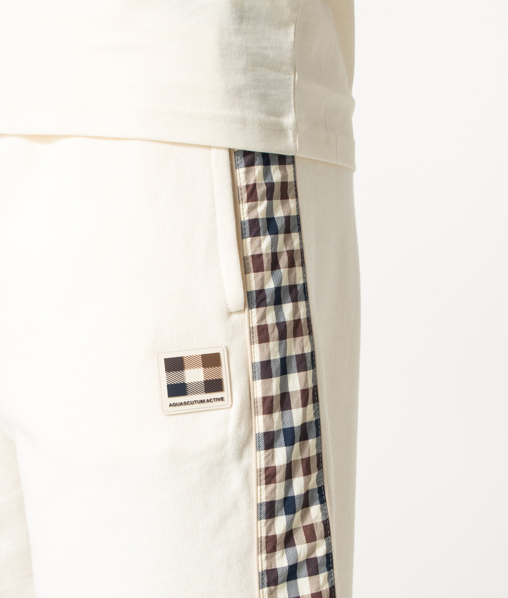 Aquascutum Lamina Insert Sweat Shorts in Old White at EQVVS Menswear. Detail shot.