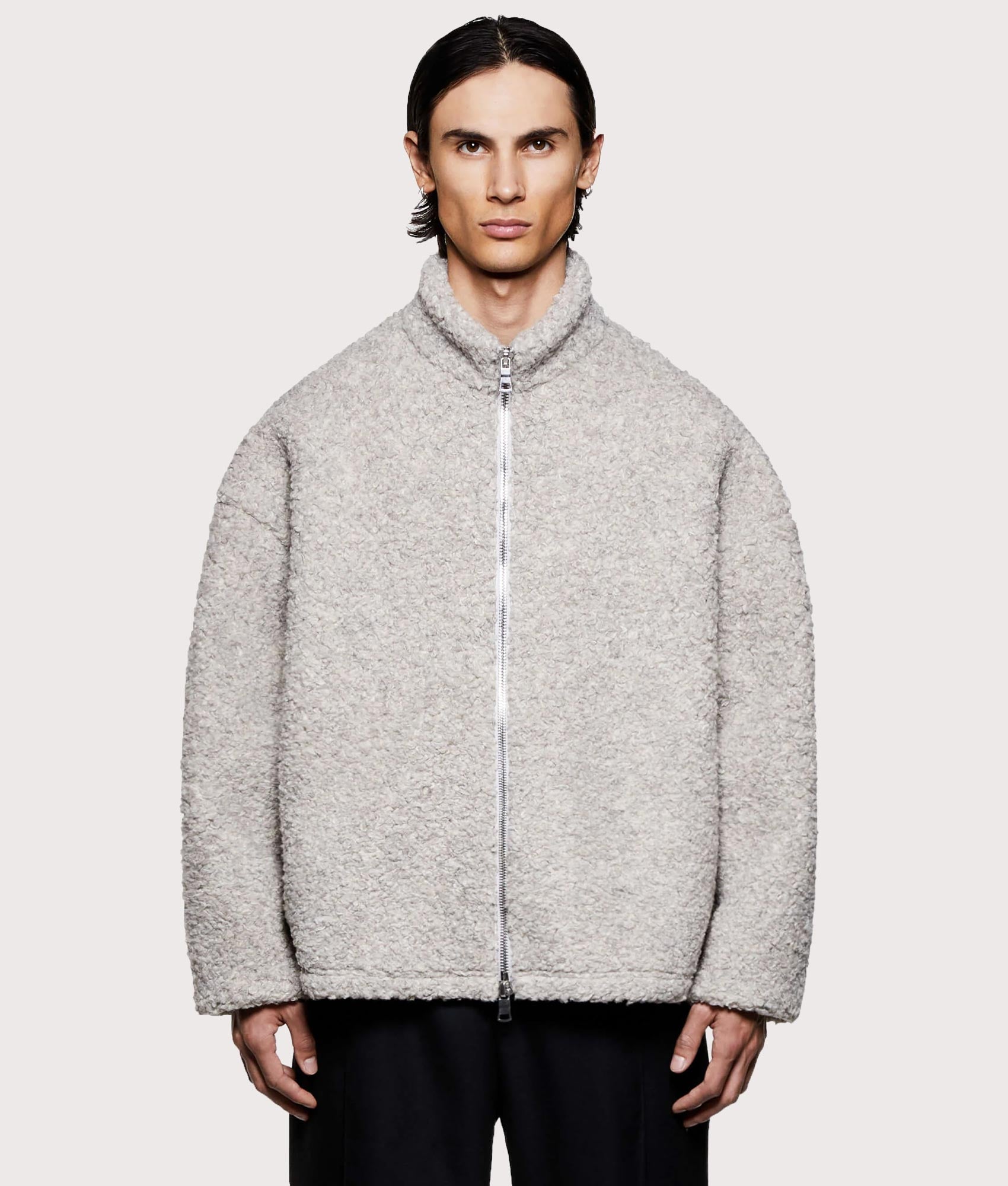 MKI MIYUKI ZOKU Wool Fleece Track Jacket in Oatmeal at EQVVS Menswear. Model front shot.