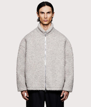 MKI MIYUKI ZOKU Wool Fleece Track Jacket in Oatmeal at EQVVS Menswear. Model front shot.