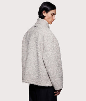 MKI MIYUKI ZOKU Wool Fleece Track Jacket in Oatmeal at EQVVS Menswear. Angled back shot.