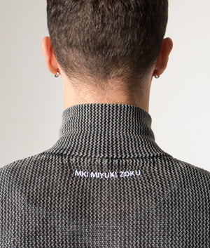 Pigment Dyed Loose Gauge Track Jacket in Black | MKI MIYUKI ZOKU | Shot at EQVVS | Back detail model shot 