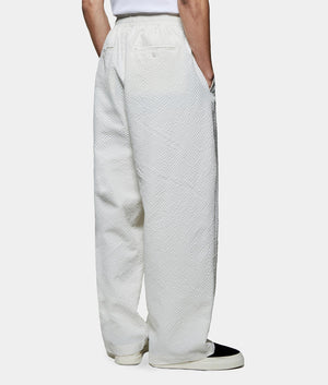 Seercucker Wide Leg Trousers. Back model angled shot by EQVVS.