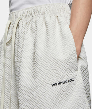 Seercucker Wide Leg Trousers. Front model detail shot by EQVVS.