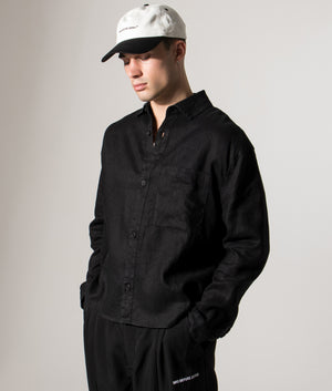 Linen Box Dress Shirt. Shot by EQVVS. Model side angled shot.