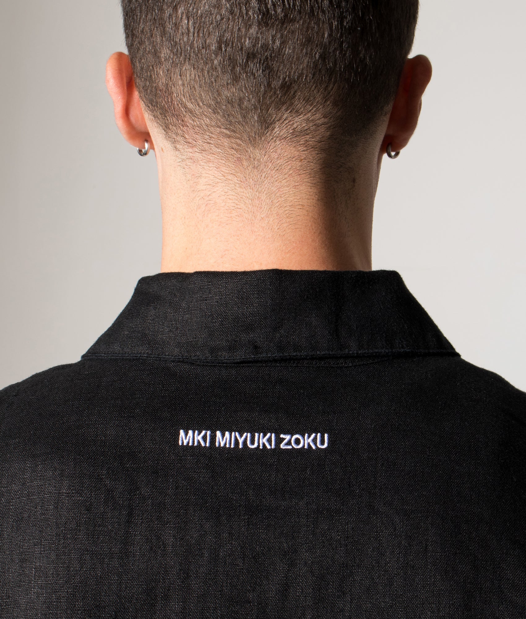 Linen Box Dress Shirt. Shot by EQVVS. Model detailed angled shot.